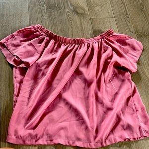 small pink off the shoulder shirt